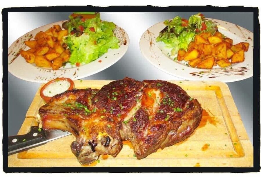 Côte de bœuf grillée servie avec frites maison – Au Petit Zinc Lyon